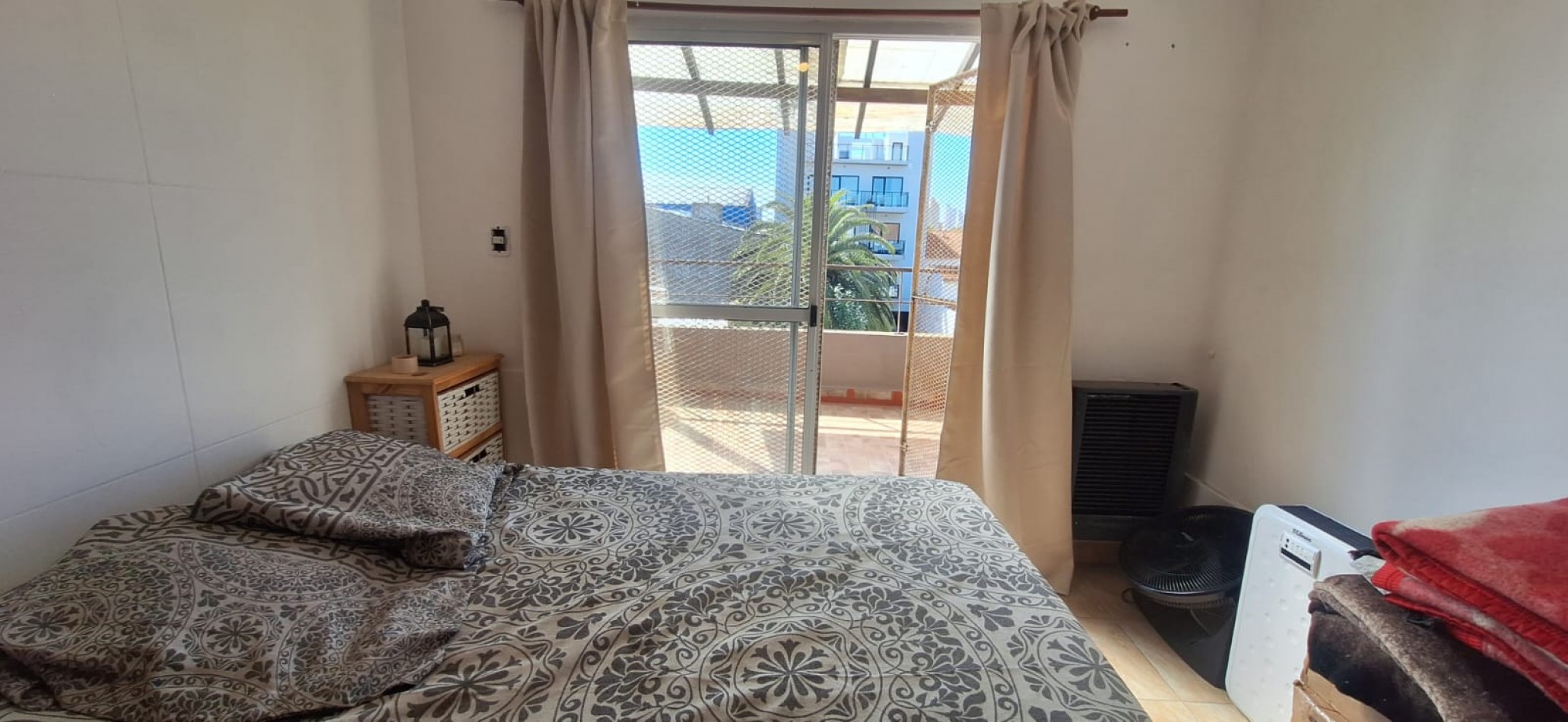 DEPARTAMENTO EN PH DE 2 AMBIENTES CON BALCON TERRAZA Y COCHERA.